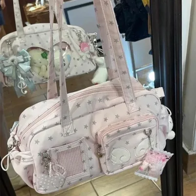Sac à bandoulière rose en simili cuir