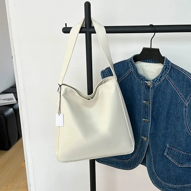 Sac à main carré porté épaule en Oxford